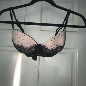 Pink and black lace bra.